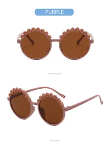 Cute purple round sunglasses for kids featuring adorable floral decals and UV protection