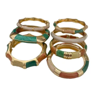 Elegant Bohemian colorful enamel drip oil open bangles in gold-plated bamboo-style design.