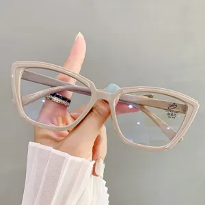 Close-up of stylish beige cat-eye anti-blue light glasses with oversized frames
