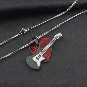 Stainless steel guitar pick pendant necklace, close-up view showing metal texture and details.