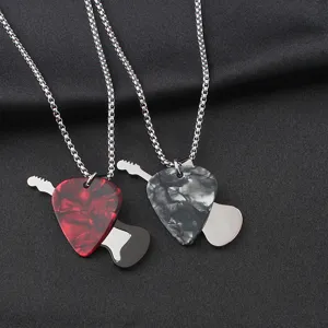 Detailed shot of stainless steel guitar pick pendant necklaces with marble pattern styles.
