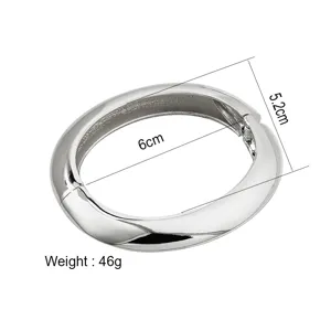 Detailed view of silver water-drop bangle showing 6cm diameter and 46g weight spec