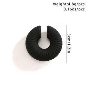 Polsino per orecchio nero a costine senza buco, clip rotonda da 3cm di diametro