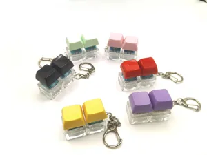 Mechanical keyboard switch keycap keychain portable decompression stress relief toy pendant.