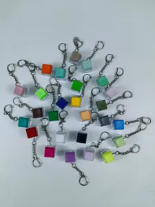 Colorful mechanical keyboard keycap fidget toy keychain with clear case and sturdy ring.