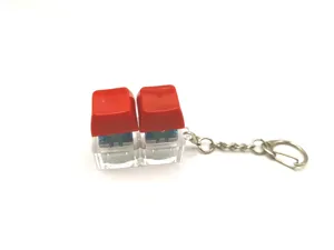 Red 2-key mechanical switch fidget keychain with clear base for stress relief toy