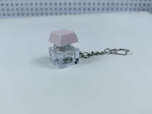Mechanical keyboard switch keychain fidget toy with LED light pink transparent