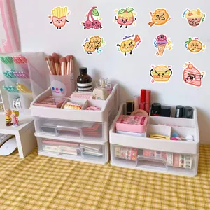 Variety of cute food-themed graffiti stickers used for decorative wall display on desk
