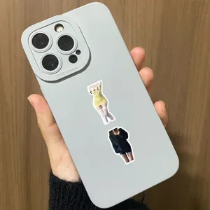 Detailed view of sexy stockings girl stickers applied to a grey phone case