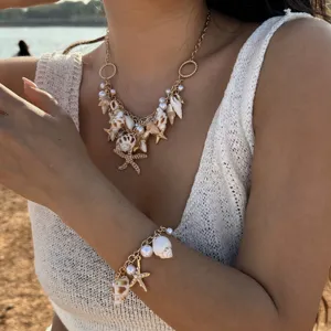 Bohemian beach shell necklace and bracelet set with pearls and starfish charms
