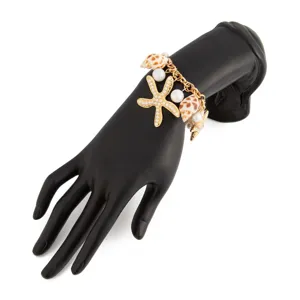 Detailed close-up of a Bohemian beach style bracelet with shell and starfish charms
