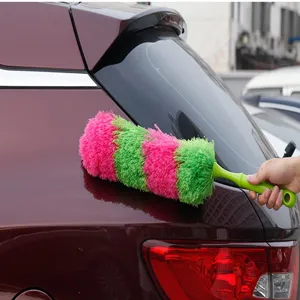 Detailed view of colorful electrostatic cleaning duster in action, perfect for dusting cars.