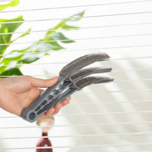 Handheld mini window blinds cleaning brush tool with 3 removable microfiber cloth sleeves.