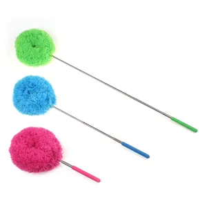 Microfiber telescopic dusters detail view, featuring colorful fluffy heads and extendable poles.
