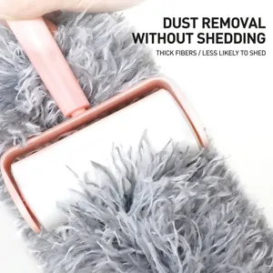 Household microfiber duster tool with pink handle for efficient cleaning and dust removal
