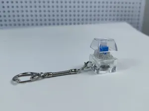 Transparante mechanische toetsenbord blauwe schakelaar sleutelhanger anti-stress speelgoed