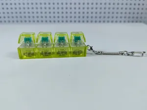 Gedetailleerd overzicht van een 4-toets transparante gele LED mechanische keychain