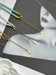 Detail of 14k gold plated necklace featuring stainless steel extender chain and clasp