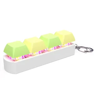 Macro view of mechanical keyboard keycap fidget toy with glowing RGB LED lighting.