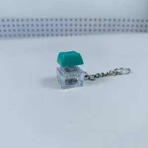 Transparent luminous mechanical keyboard switch keychain decompression stress relief toy.