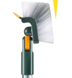 Detail of 5-in-1 floor brush head with stiff bristles and scraper for tile cleaning