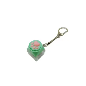 Porte-clés touche mécanique en forme de patte de chat avec coussinets en silicone rose