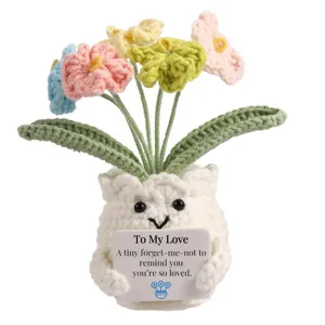 Handmade crochet forget-me-not flower potted plant, cute doll ornament for desk decoration.