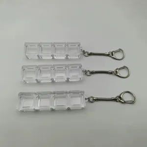 Set of three clear 4-slot mechanical keyboard switch tester base keychain frames.