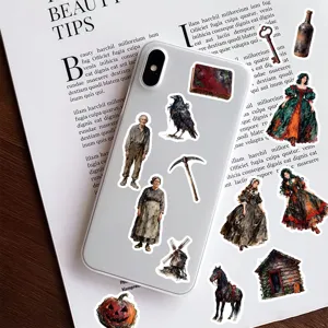 Close-up of vintage Sleepy Hollow oil painting style stickers applied on a phone case.