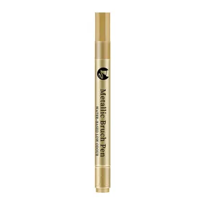 Metallic gold brush pen with soft tip and low odour water-based ink for greeting cards