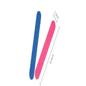 Detailed macro view of two colorful 8.5cm mini emery board nail files for professional manicure