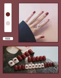 Detail view showing 24pcs burgundy and pink press-on nails with cute heart patterns