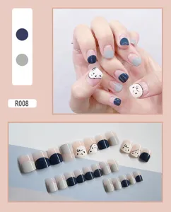 Detail of cute cartoon press-on nails set in navy blue and grey, 24 pieces pack
