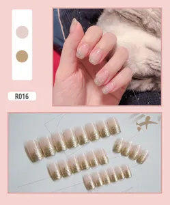 Detail of 24pcs champagne glitter ombre press-on nails set with model display show