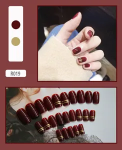 Glossy burgundy press-on nails set of 24 pieces with elegant gold stripe details