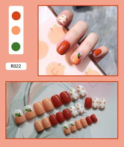 Cute hand-painted peach pattern press-on nails with 24-piece assorted size nail kit