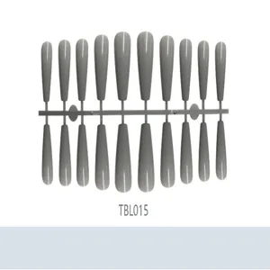 Set of grey long ballerina press-on nails displayed on a professional plastic strip