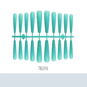 Detailed view of extra long teal coffin press-on nails on strip runner