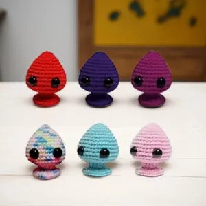 Colorful handmade crocheted emotional support plug plushies for home decor and gifts
