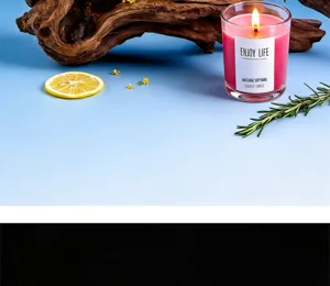 Scented candle in glass jar with pink soy wax, perfect for home decor and relaxing atmosphere.