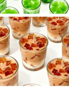 Close-up detail shot of creative iced coffee jelly scented candle in glass cup with soy wax.