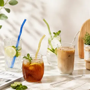 Colorful wavy glass straw set with transparent cups for creative drinks and daily kitchen use.