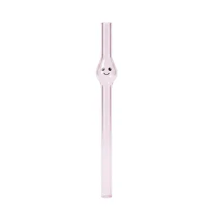 Pink glass drinking straw with cute smiley face bulb design, clear and durable aesthetic.