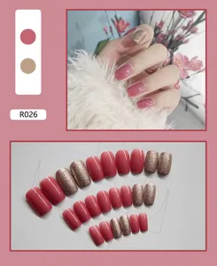 Detailed view of 24pcs pink and gold glitter press-on nails with lifestyle shot.