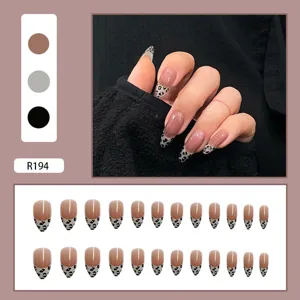 Elegant French leopard print press-on nails almond shape with nude pink base R194 model