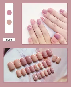 Close-up detail of 24pcs pink and nude plaid pattern press-on false nails set