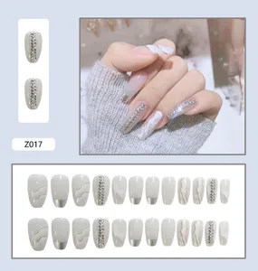 Kit de faux ongles blancs professionnels avec strass élégants et motif marbré 24pcs