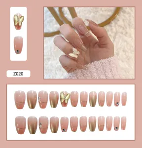 Détails de faux ongles dégradé rose avec papillon doré 3D et strass brillants