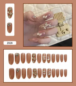 Élégant kit de 24 faux ongles papillon nude avec strass brillants et décoration