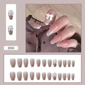 Lot de 24 faux ongles nude dégradé avec nœuds blancs élégants et pointes French